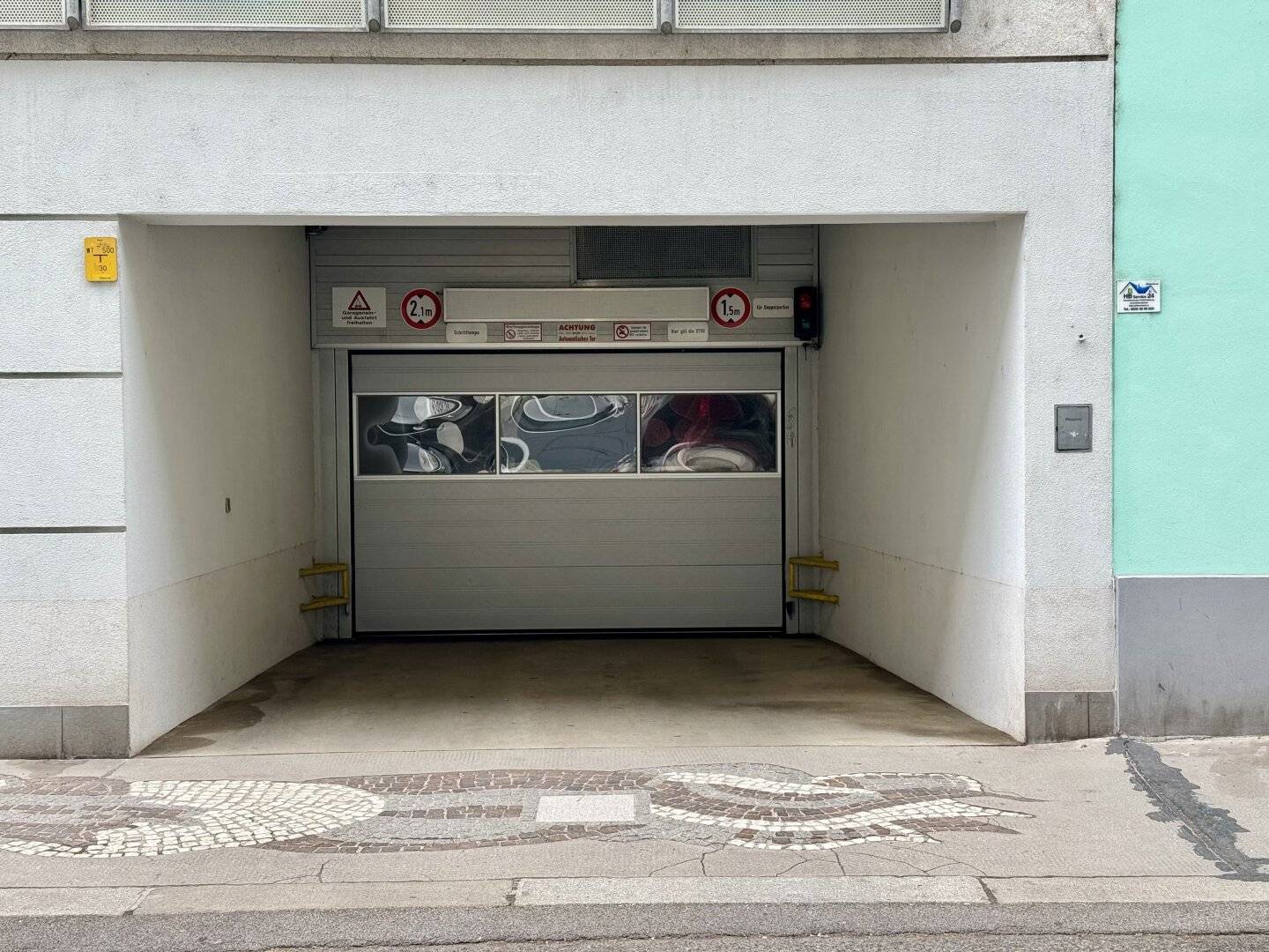 Underground garage parking spaces for rent directly at the Hundertwasser House