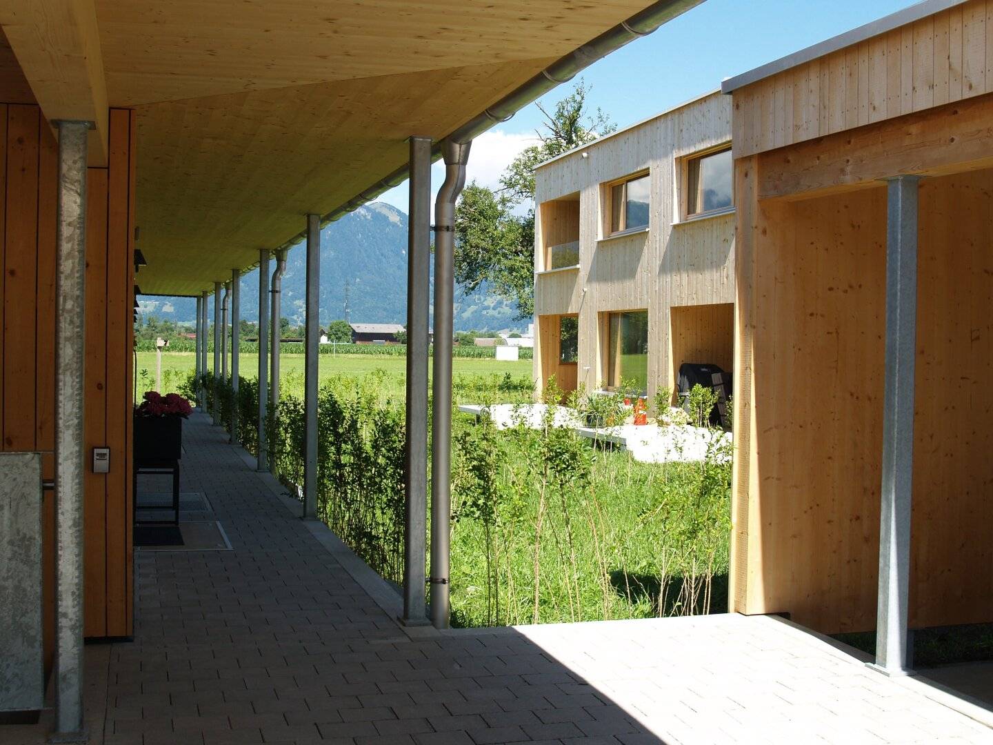 Neubau - Vollholz, 5 Zimmer Wohnung in Feldkirch Gisingen und eigenem Kellerzugang und Garten, Bezug kurzfristig möglich.