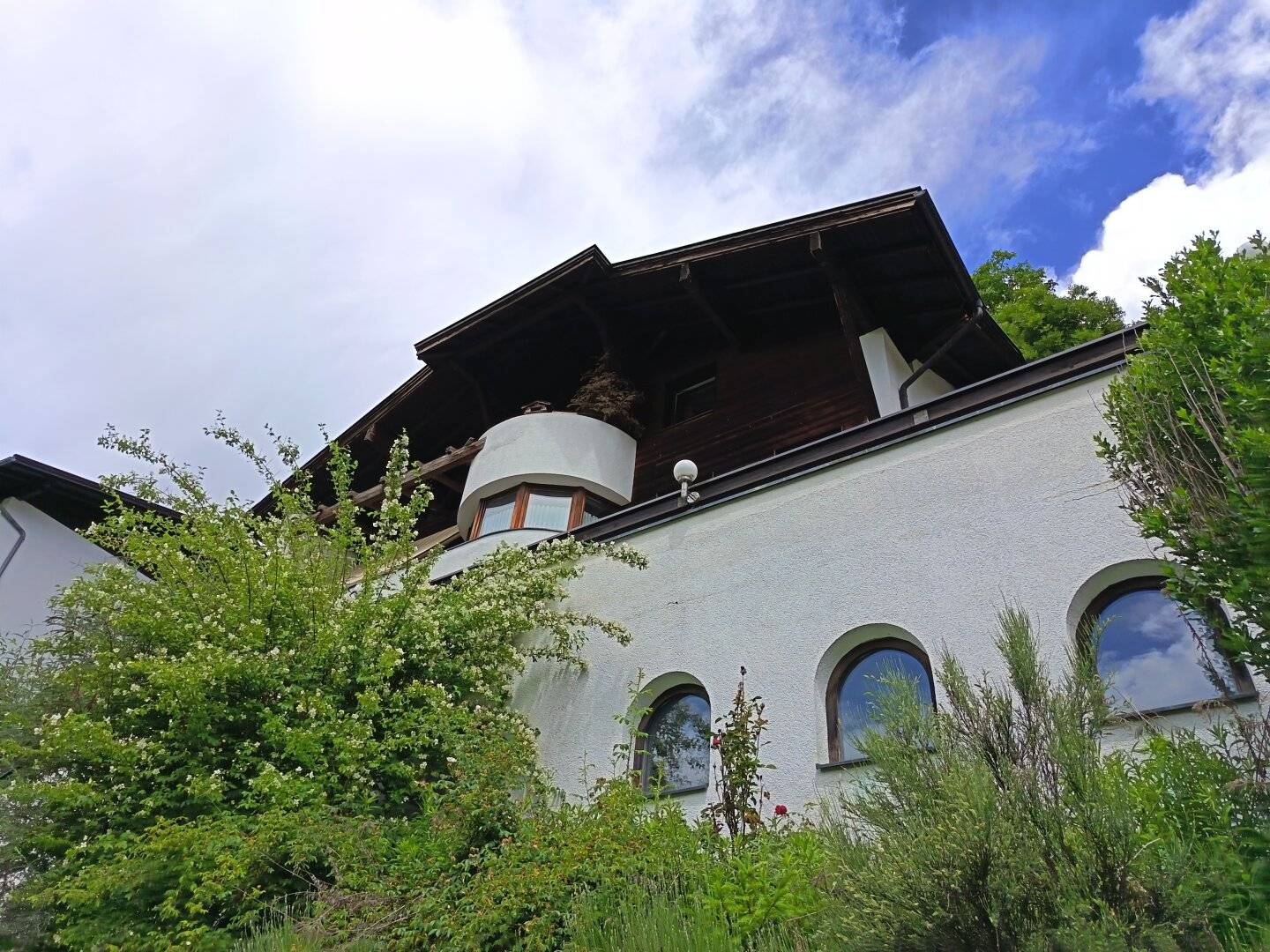Haus in 0mes 180m² mit Garten, Garage und atemberaubendem Bergblick!
