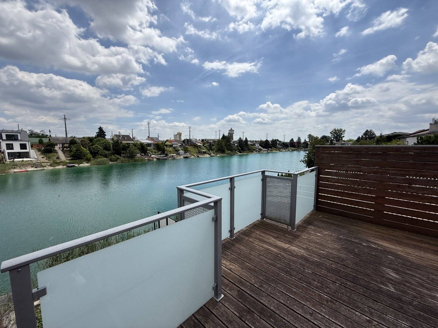 Unique lakeside property with direct water access, terraces and own land