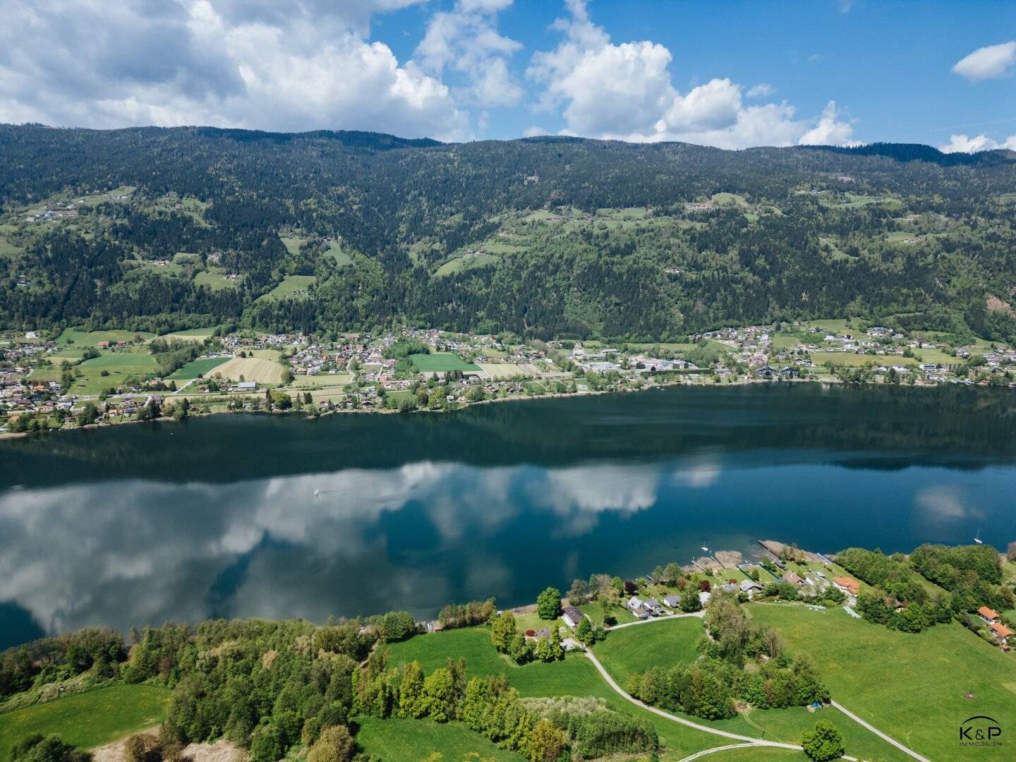 Exklusives Baugrundstück mit Seeblick und Freizeitwohnsitzwidmung – Rarität am Ossiacher See