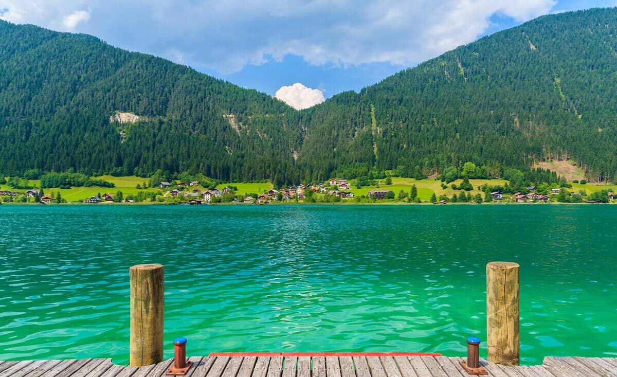Baugrundstück mit Seeblick am Weißensee: 1.219 m² exklusives Bauland in Neusach – Ohne Bauzwang