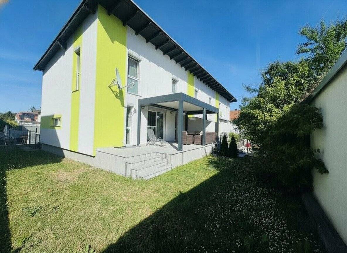 Your home in the green, modern end terrace house with up to date heating and ventilation technology