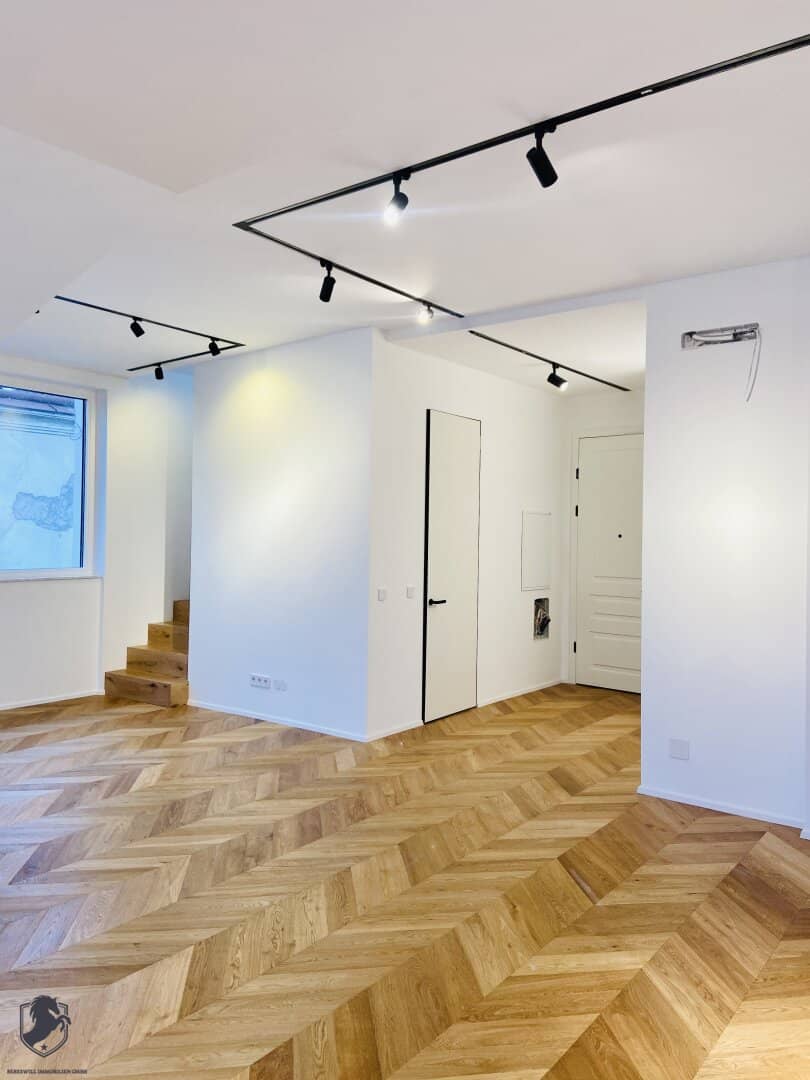 Modern top-floor apartment in exclusive first occupancy with 56 m² sunny roof terrace in exclusive finish
