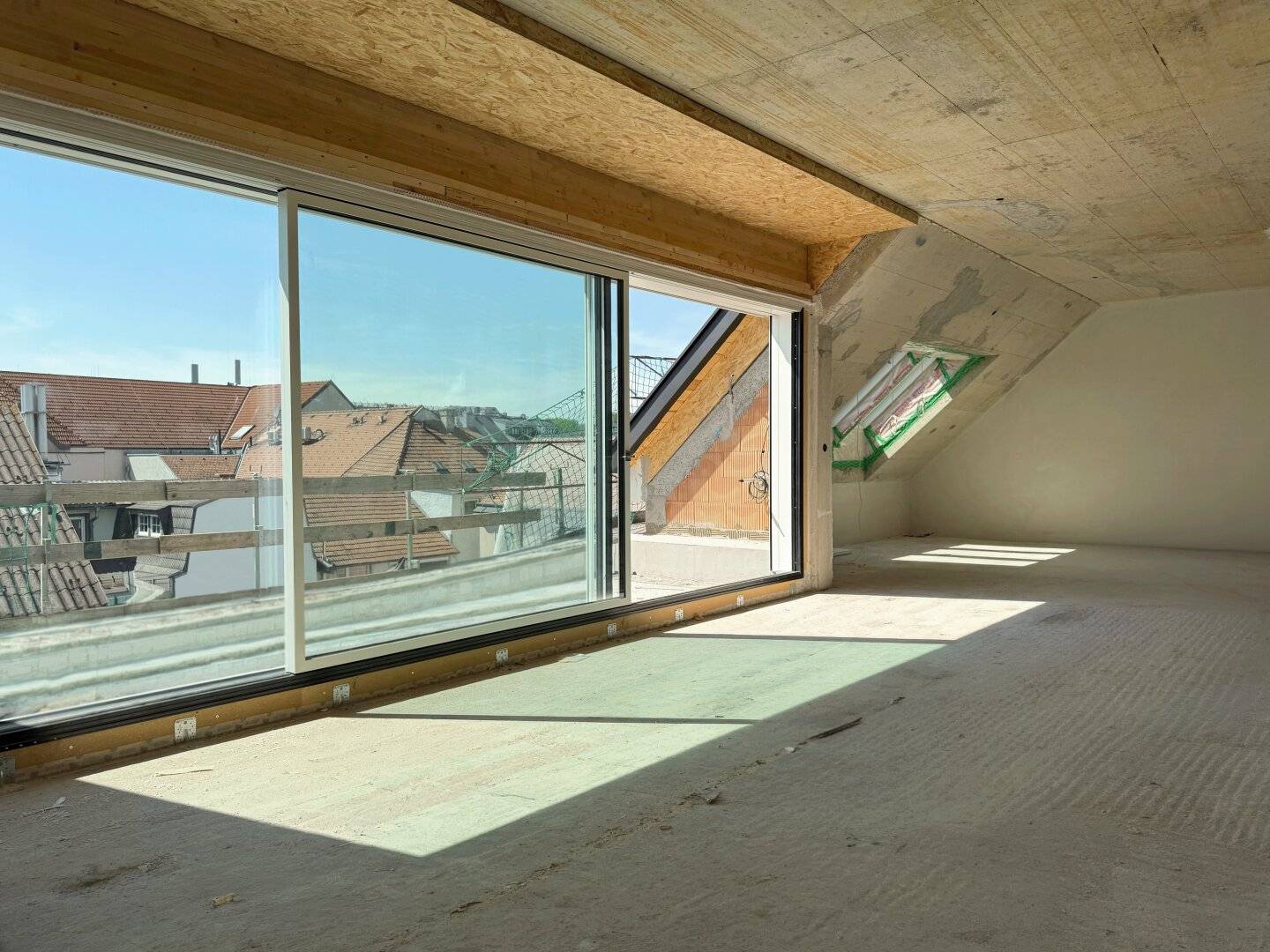 Luxus-Dachgeschosswohnung in Bau direkt am Hauptplatz!