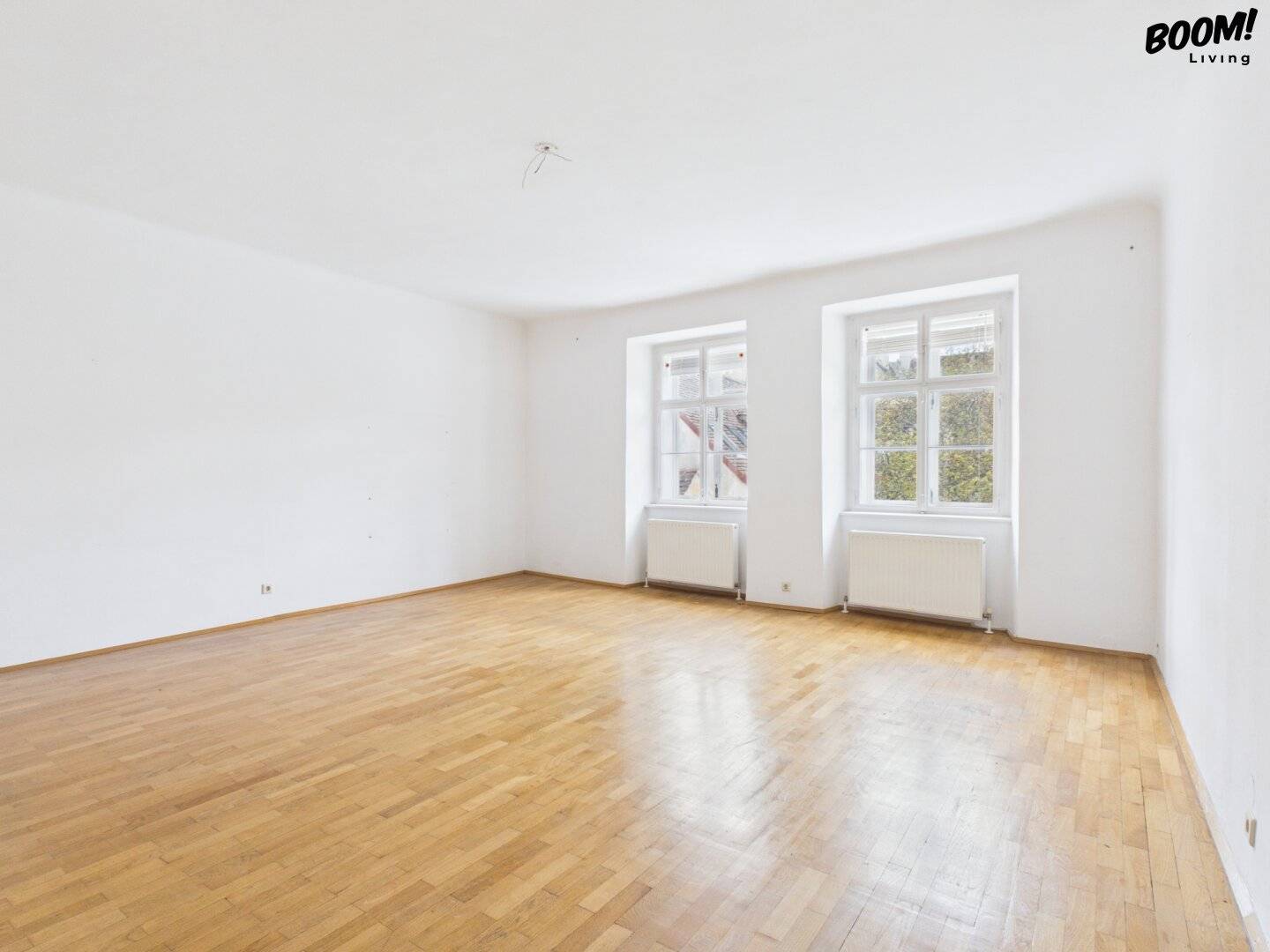 Charmantes City-Apartment in Toplage der Singerstraße – renovierungsbedürftig mit großem Gestaltungspotenzial