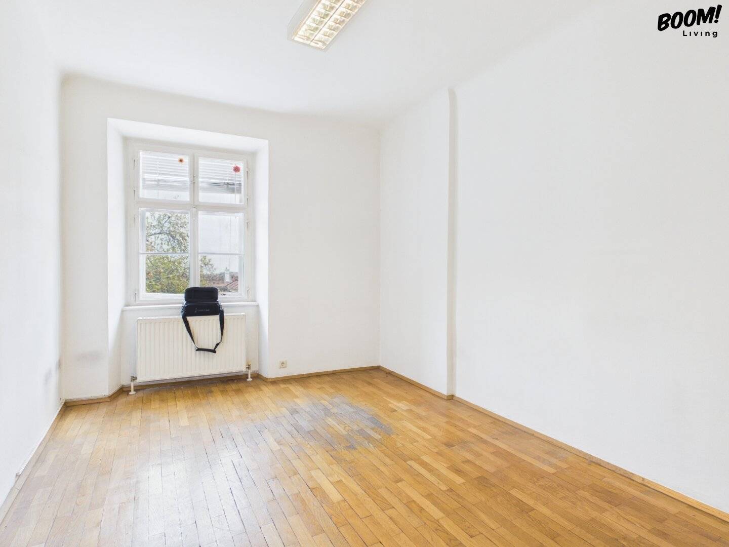 Charmantes City-Apartment in Toplage der Singerstraße – renovierungsbedürftig mit großem Gestaltungspotenzial