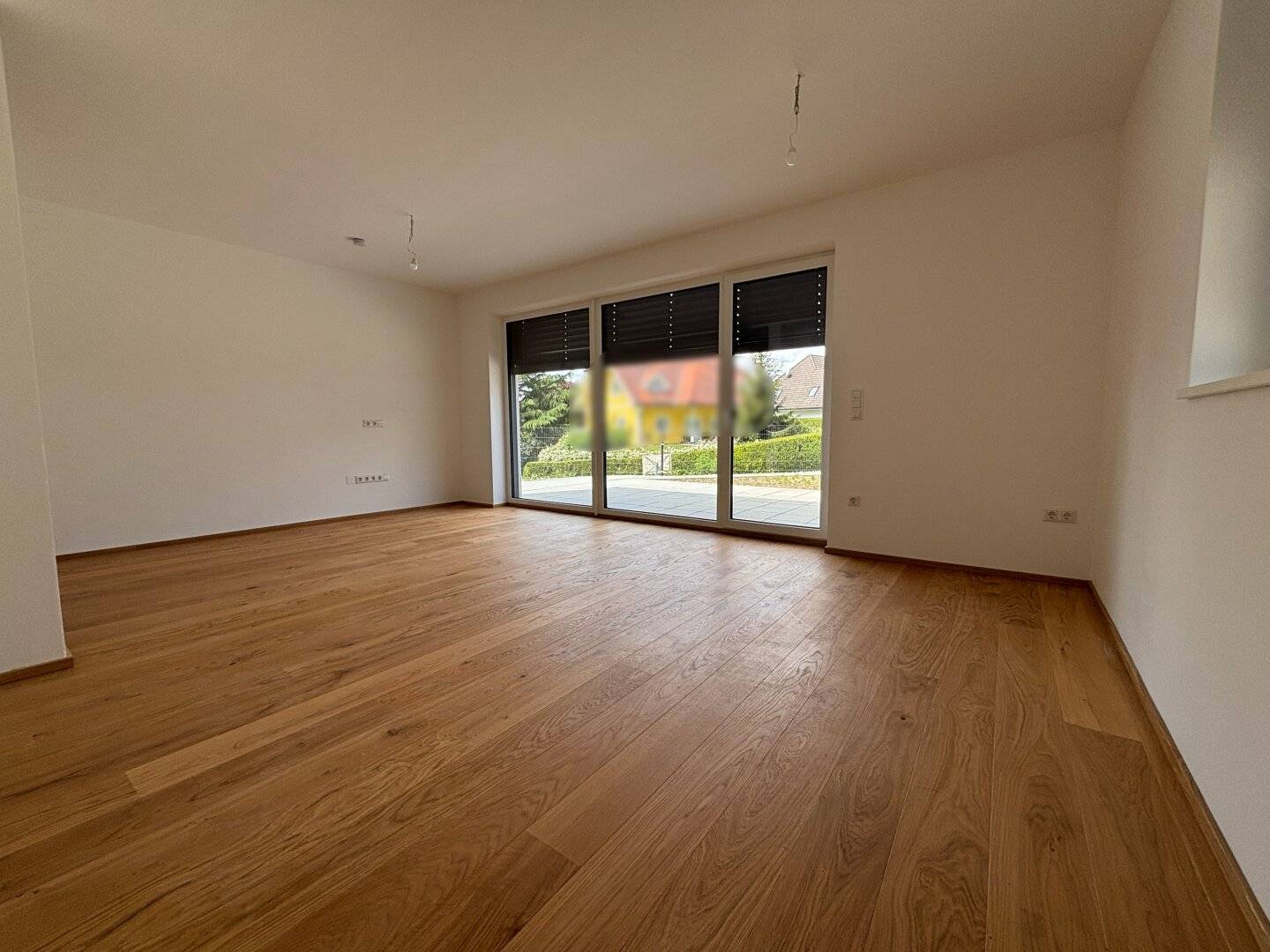 Moderne Erstbezugswohnung mit Garten & Doppelcarport!