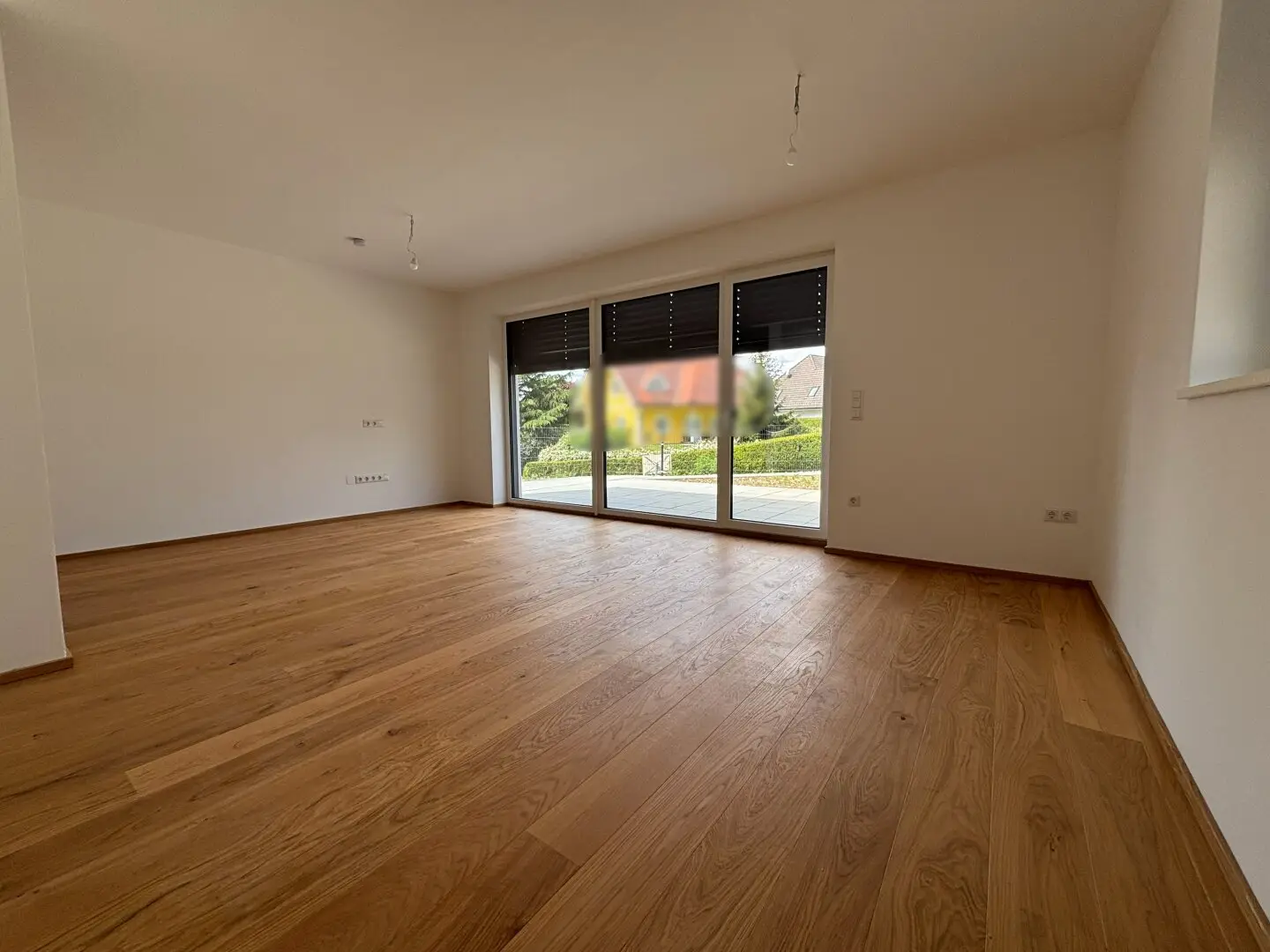 Moderne Erstbezugswohnung mit Garten & Doppelcarport!