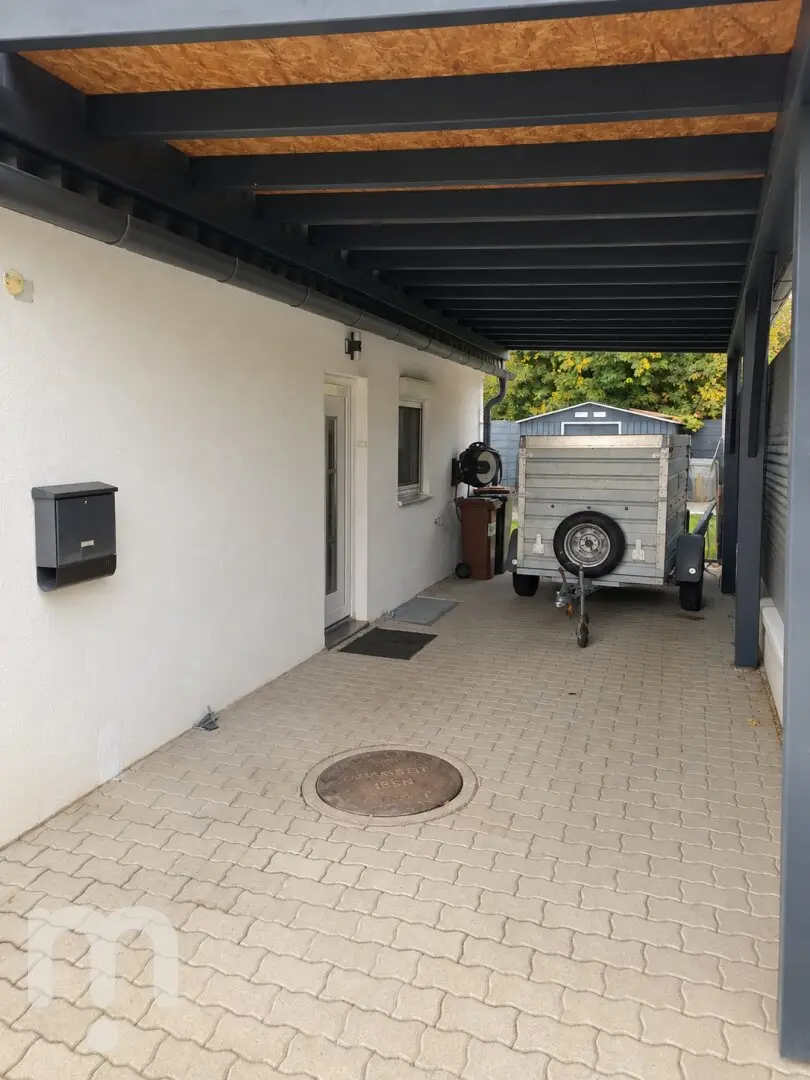 EIGENGRUND | gepflegtes Kleingartenhaus mit 5 Zimmern, Garten & Doppel-Carport in Stockerau