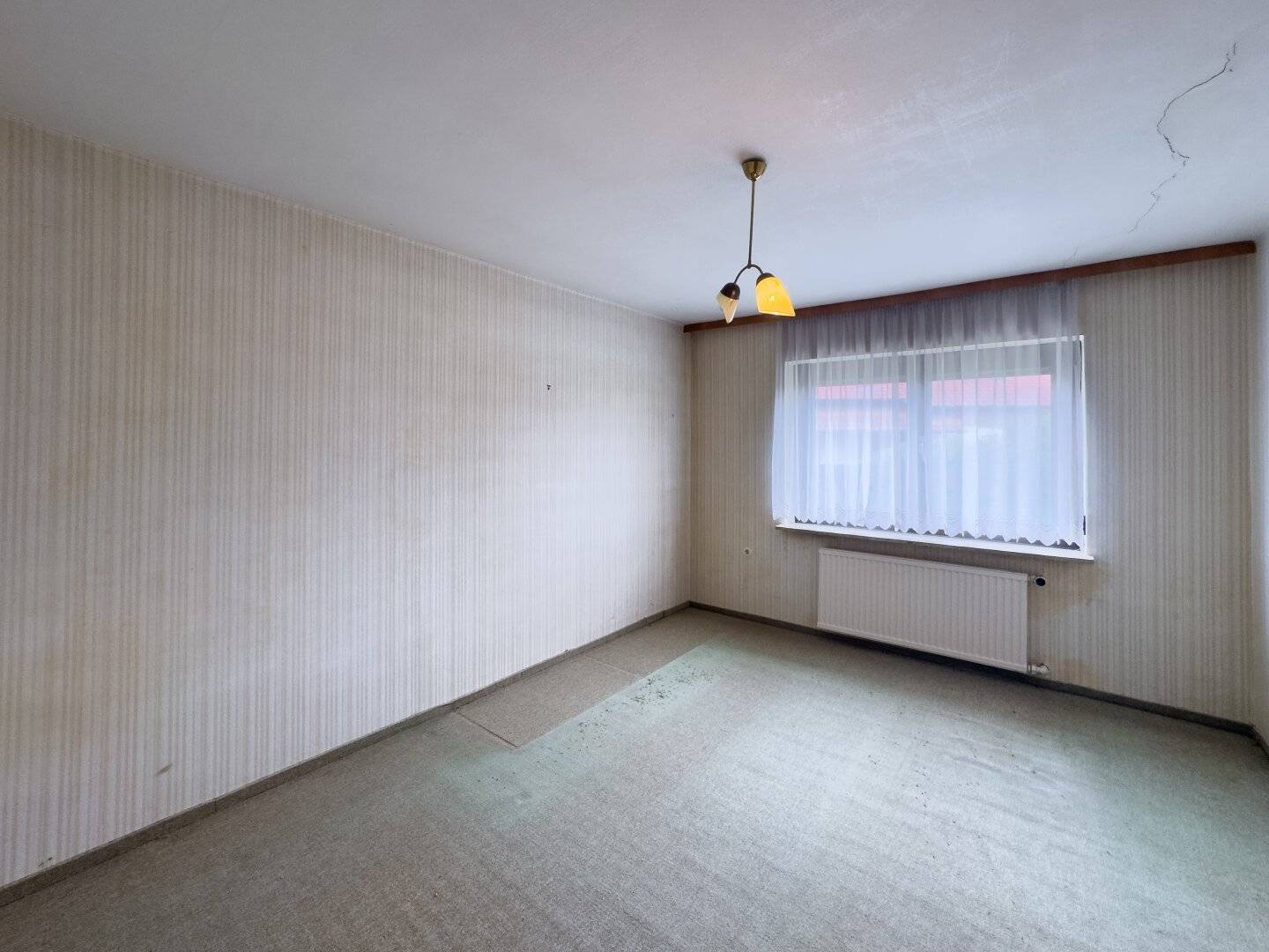 SANIERUNGSBEDÜRFTIGES WOHNHAUS IN BRAUNAU
