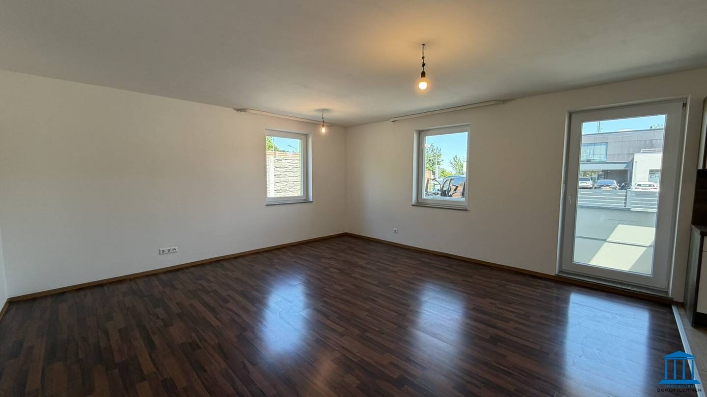 Terrassen-Wohnung im Erdgeschoss mit Einbauküche und bis zu zwei PKW-Abstellplätzen / Top 1
