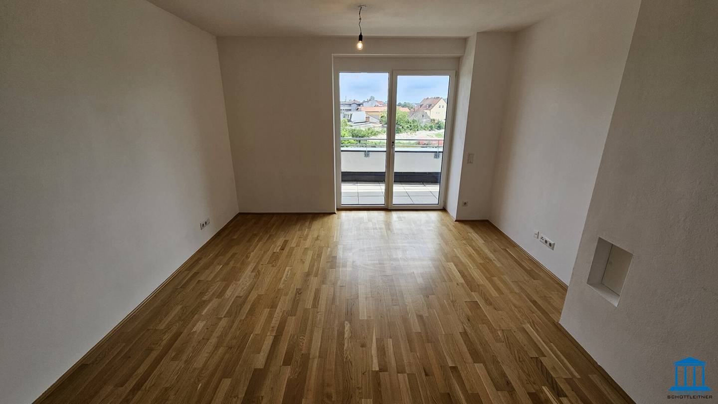 Geförderte Genossenschaftswohnung im 2. Liftstock mit Loggia & Tiefgaragenparkplatz (Top 13)