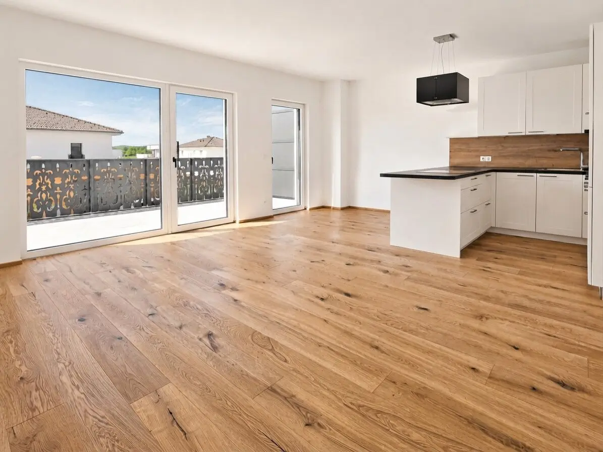 ERSTBEZUG - 2 MONATE MIETFREI: Exklusive 3-Zimmer-Wohnung mit 27 m² Terrasse, 2 Stellplätzen & 40 kw Photovoltaikanlage