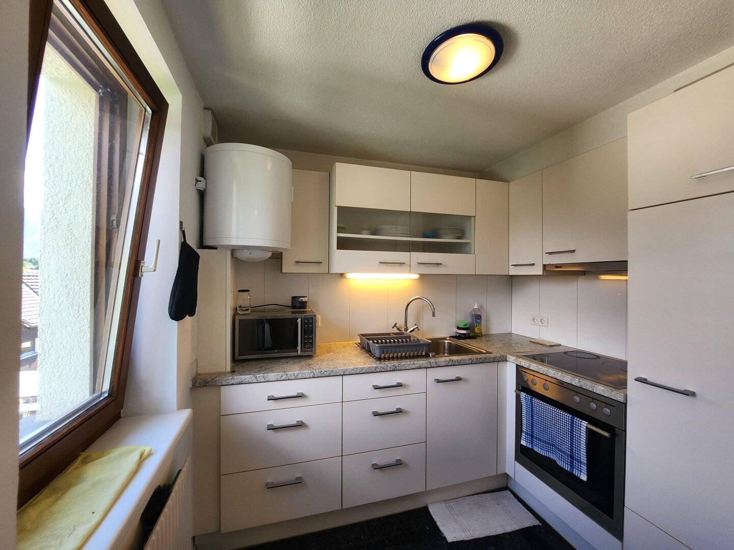 1 Zimmer Wohnung mit Balkon und einem Tiefgaragenplatz