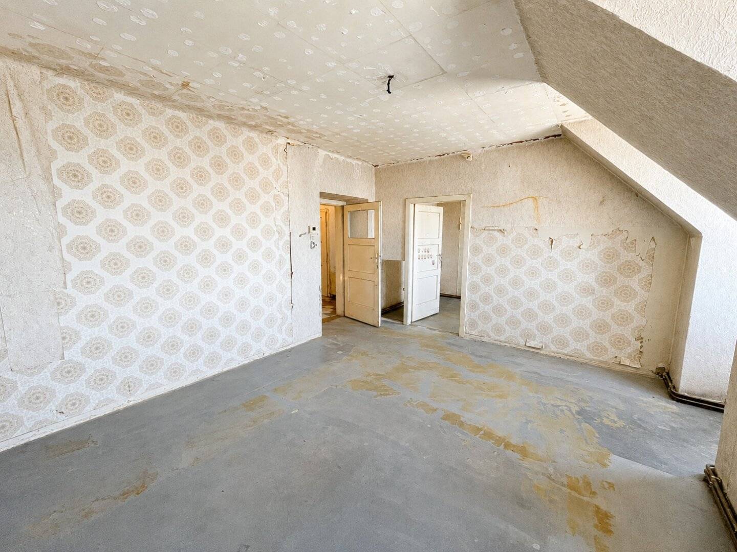Cozy attic apartment awaits your personal touch!