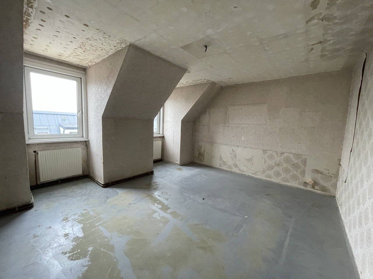 Cozy attic apartment awaits your personal touch!