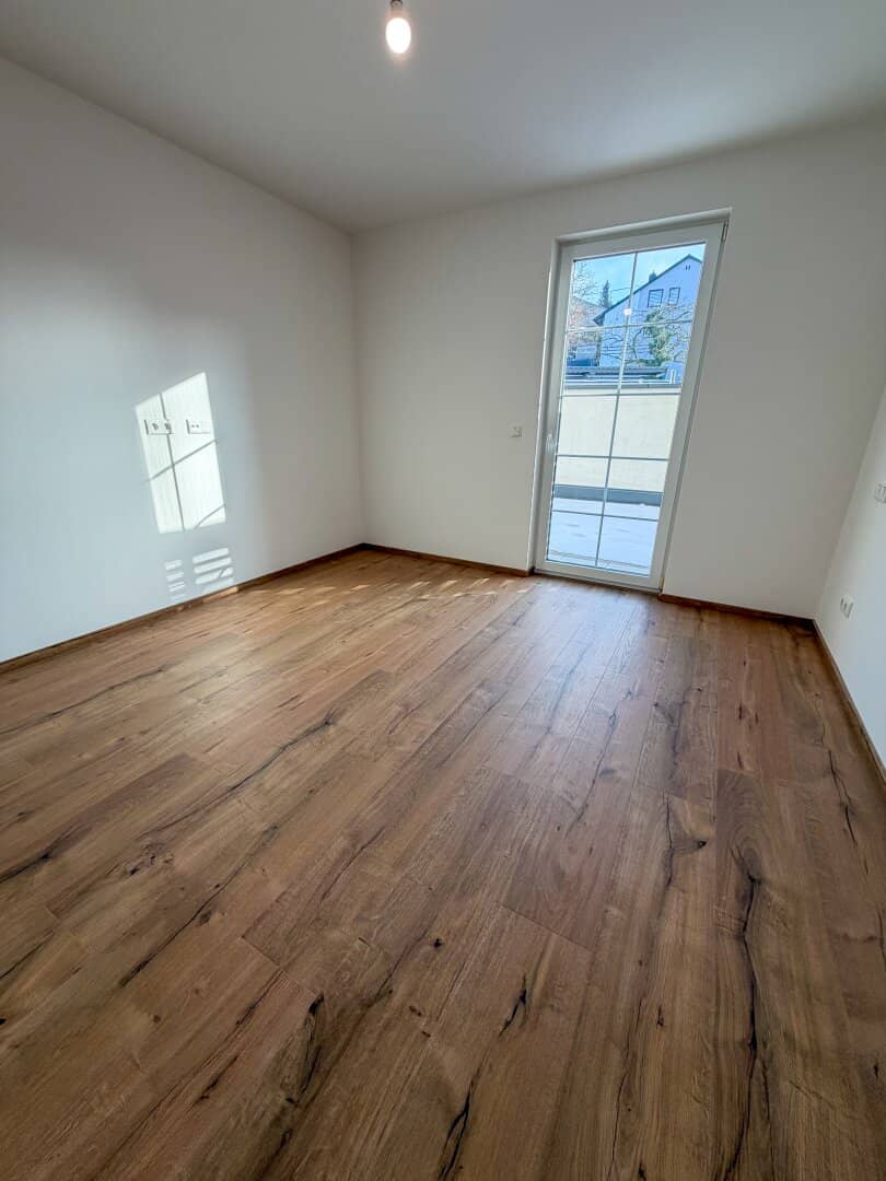 Moderne Erdgeschosswohnung mit Terrasse und Tiefgarage