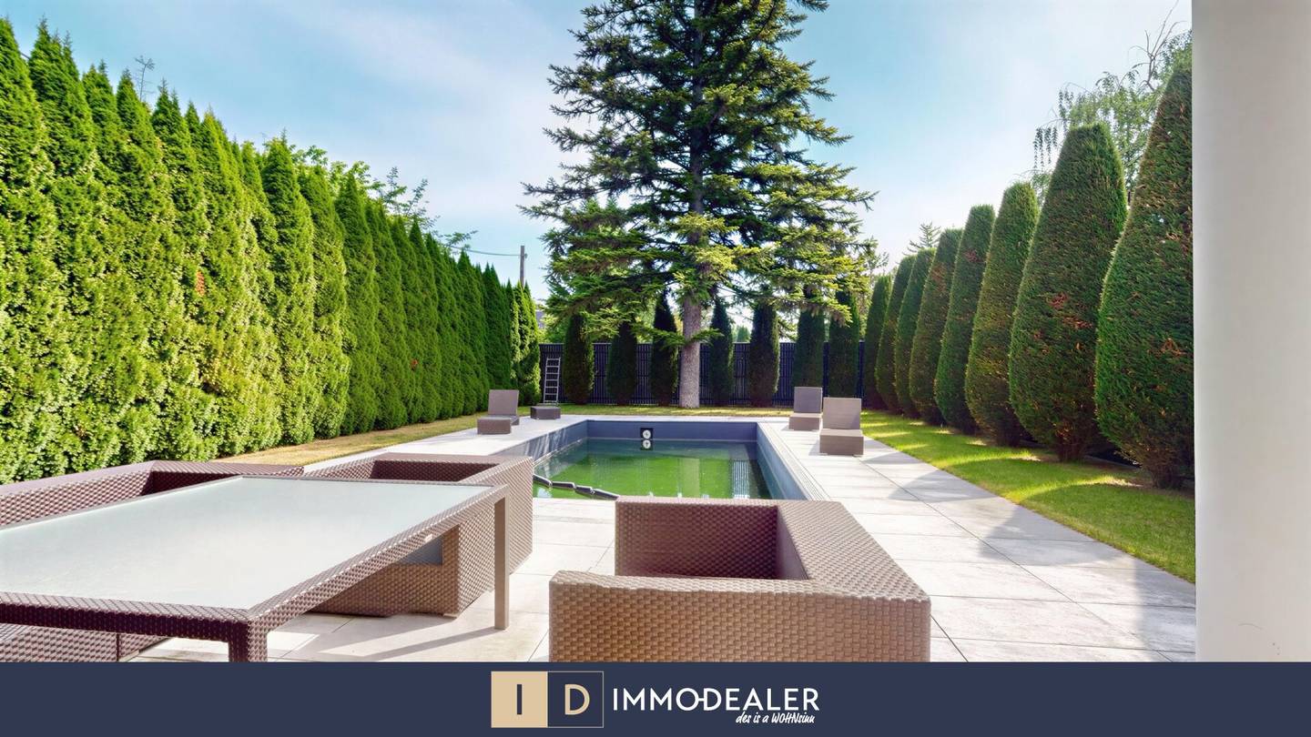 ** ARCHITEKTONISCHES MEISTERWERK MIT POOL - GARAGE & PREMIUM AUSSTATTUNG **