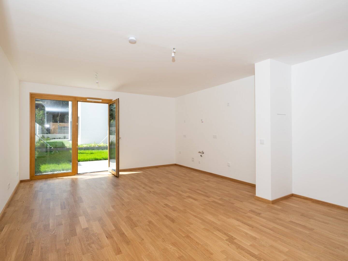 Neubau | Großzügige 1-Zimmer-Wohnung mit ruhigem Garten in Innenhoflage