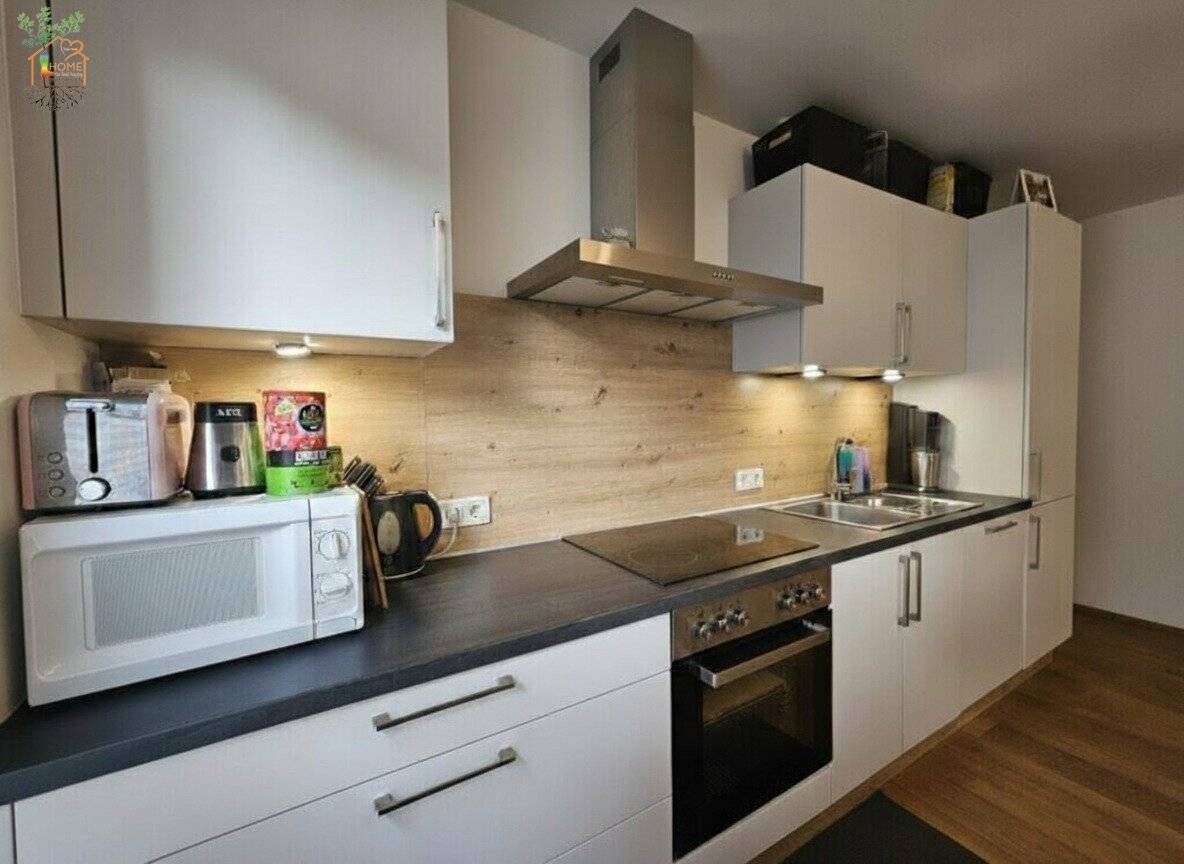 Neuwertige, vermietete Anlegerwohnung mit Garten, Nähe Achensee