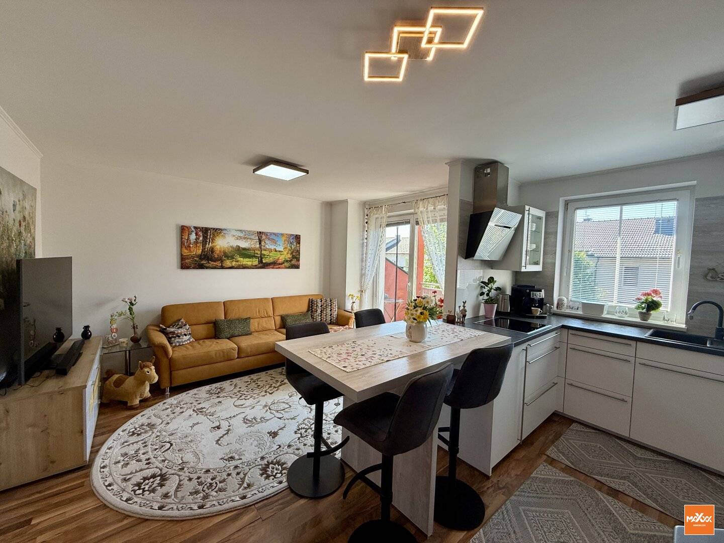 Wohnen auf zwei Ebenen – Maisonette mit Balkon, Kamin und Wohlfühlcharakter