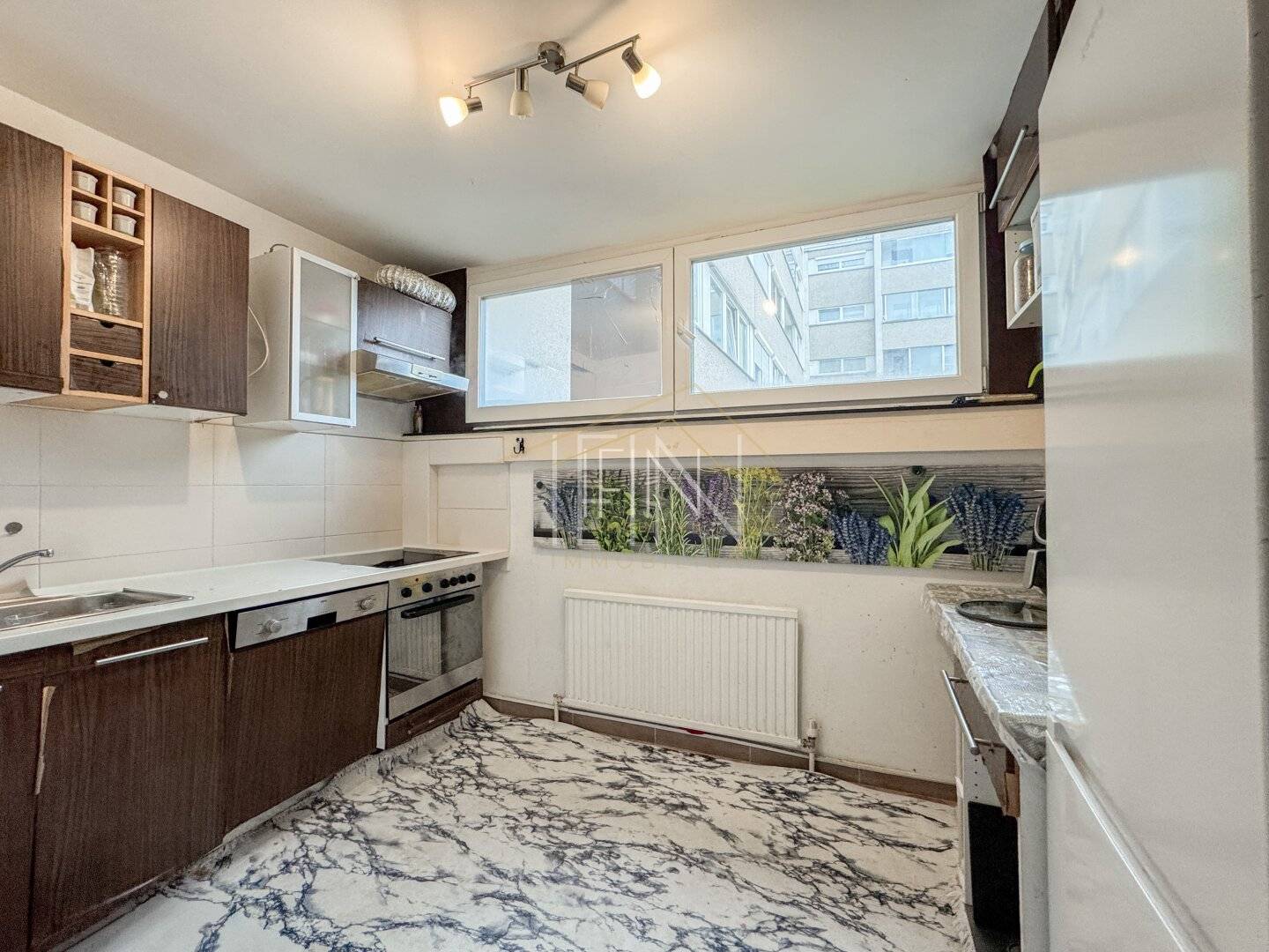 Urban wohnen mit Lift & Garage – 2 Zimmer nahe Wienerberg
