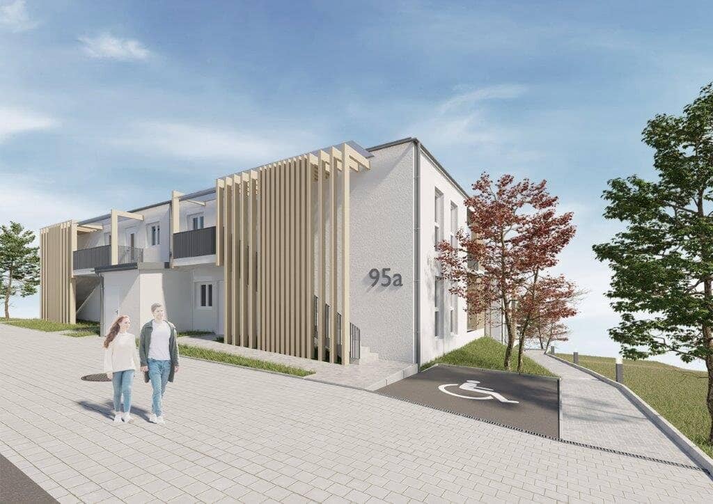 Moderne Neubauwohnung mit überdachter Terrasse im Grünen
