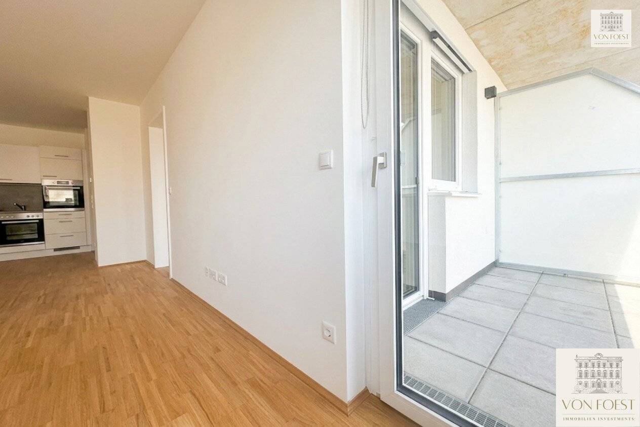 Sonnige NEUBAU-Wohnung mit Loggia I Tischlerküche I Echtholzparkett