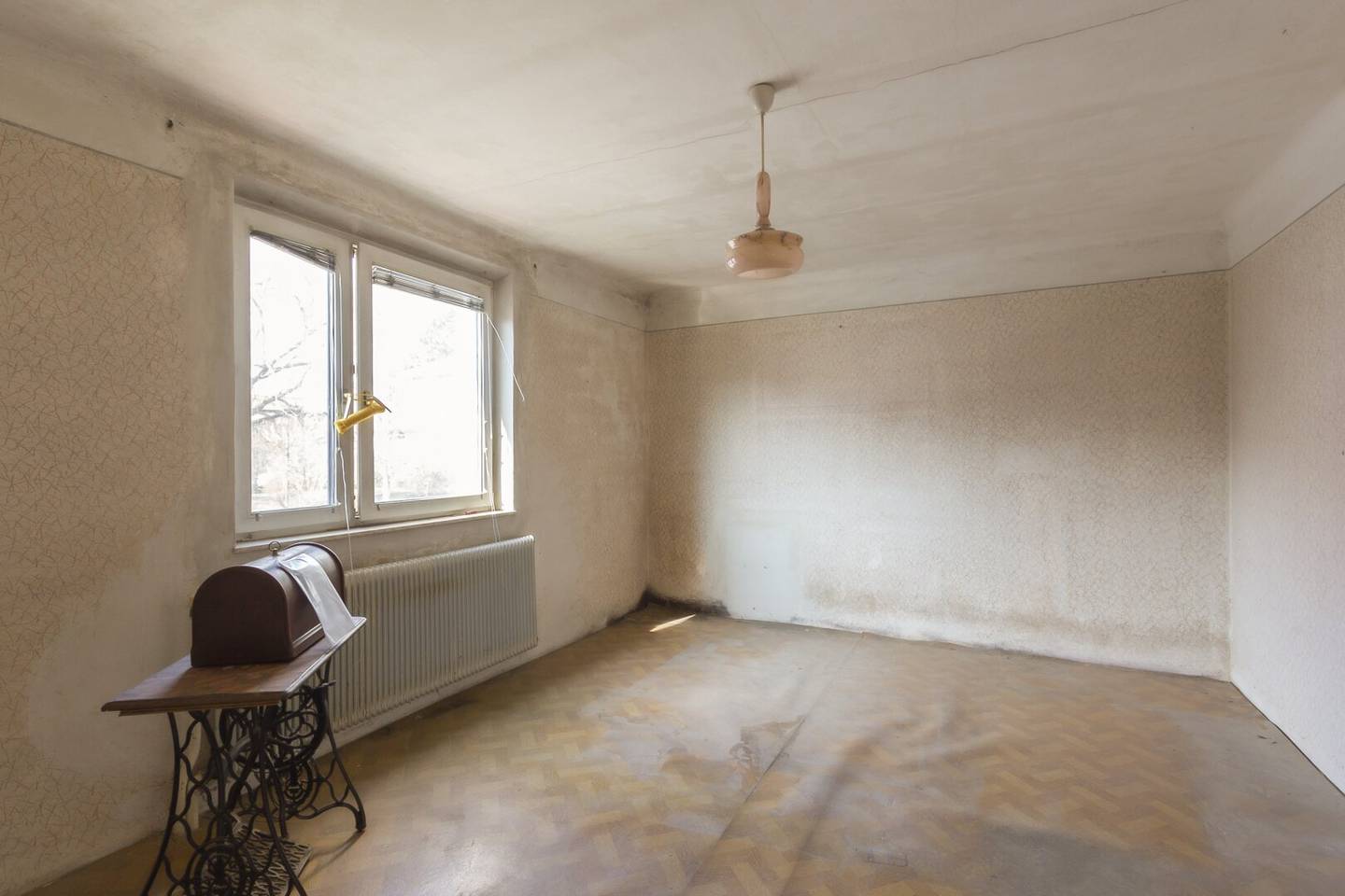 Oberlaaerstraße - renovierungsbedürftiges Einfamilienhaus mit Garage