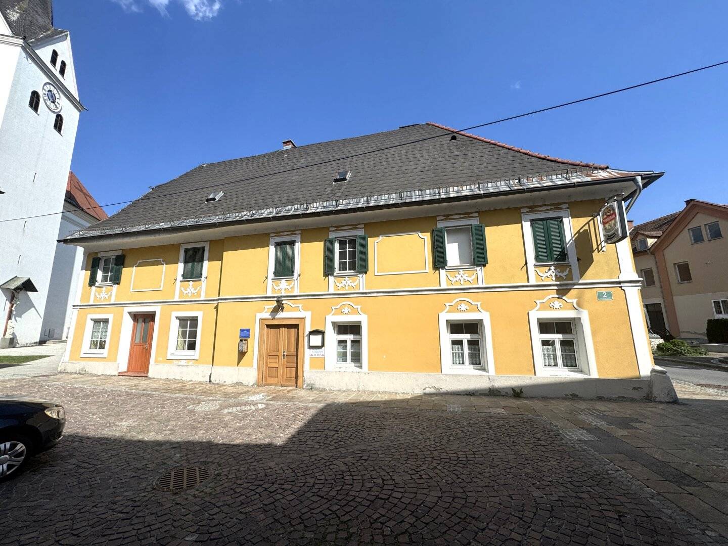 Vielseitige Liegenschaft mit Wohn-, Gastronomie- und Gewerbeflächen im Zentrum von Köflach – direkt neben der Kirche