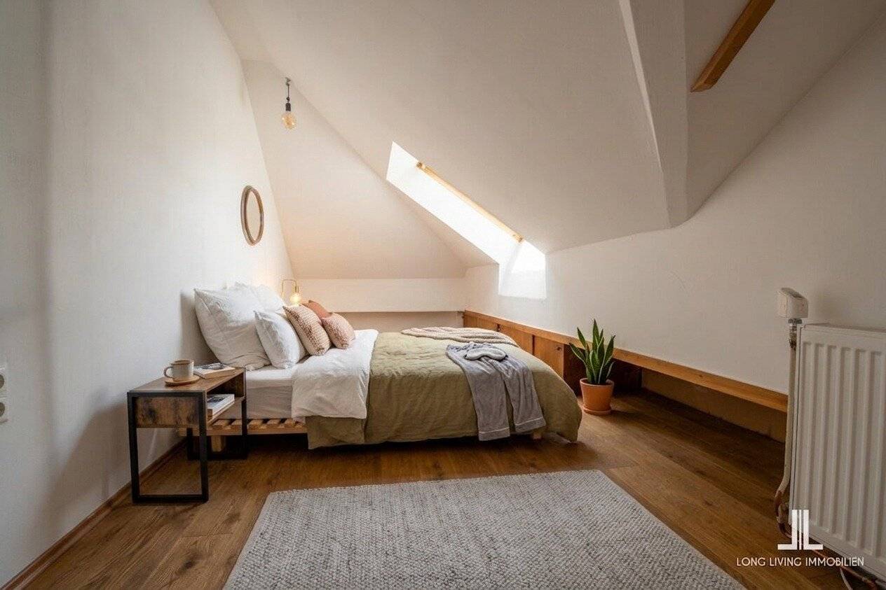 Exklusive Penthouse-Maisonettewohnung mit Dachterrasse und Blick über das Herz-Jesu-Viertel