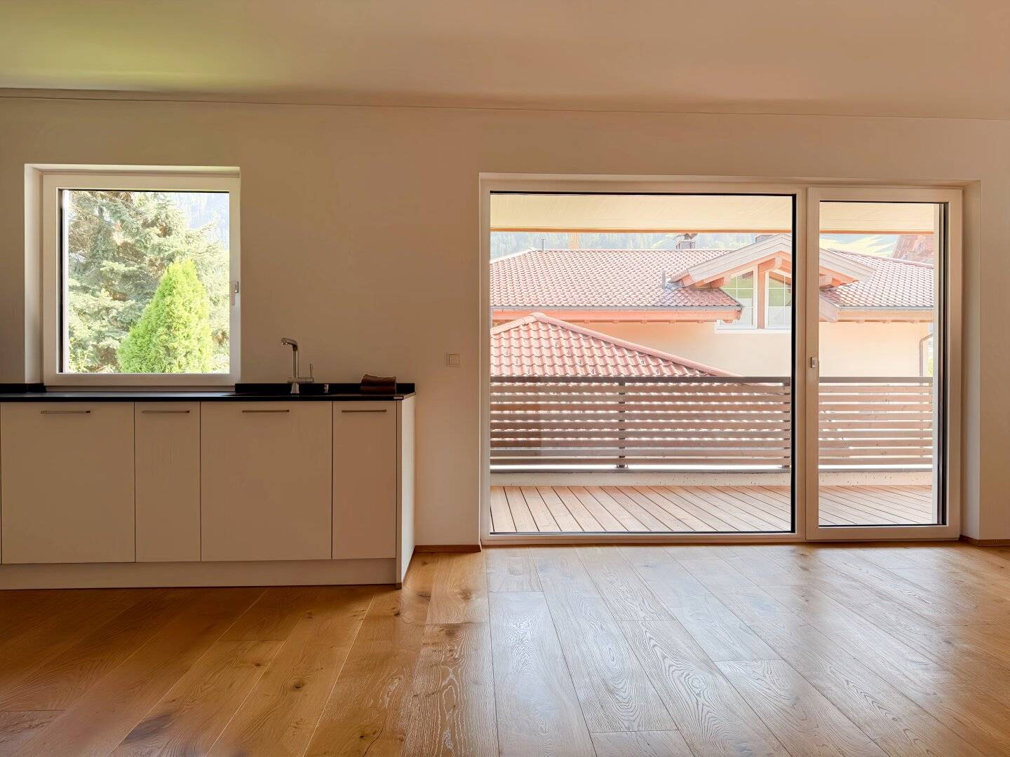 Ihr Wohlfühl-Zuhause in Niederau – elegante Wohnung mit Designküche und Balkon mit Bergblick