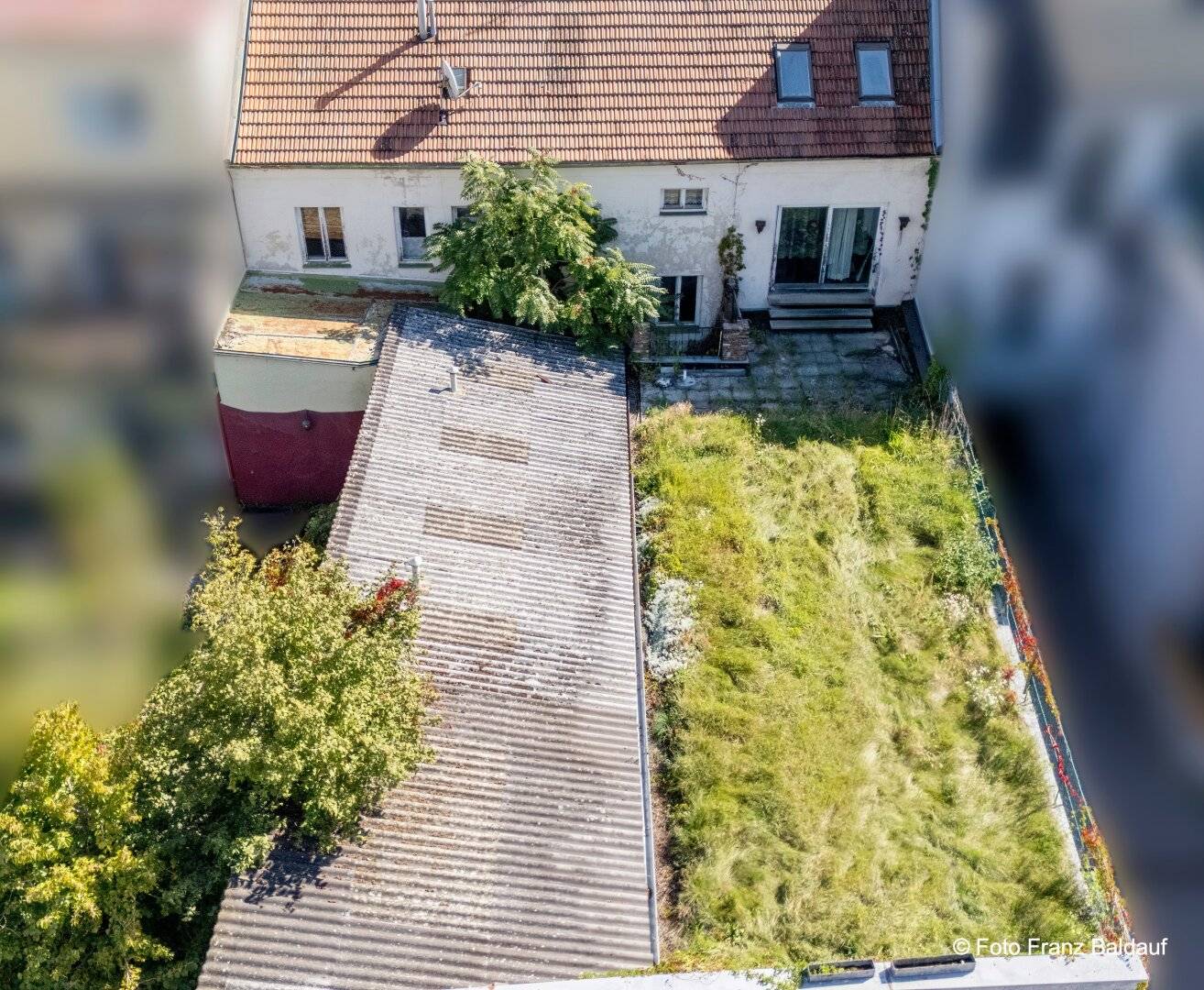 Mehrfamilienhaus mit Dachgarten und Garage für mehrere Fahrzeuge mitten im Zentrum (Bestlage)