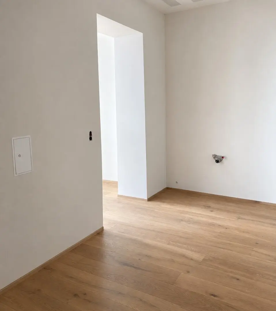 Erstbezug Oktober 2026 · 1-Zimmer-Wohnung nahe Bahnhof Floridsdorf · Einbauküche inklusive