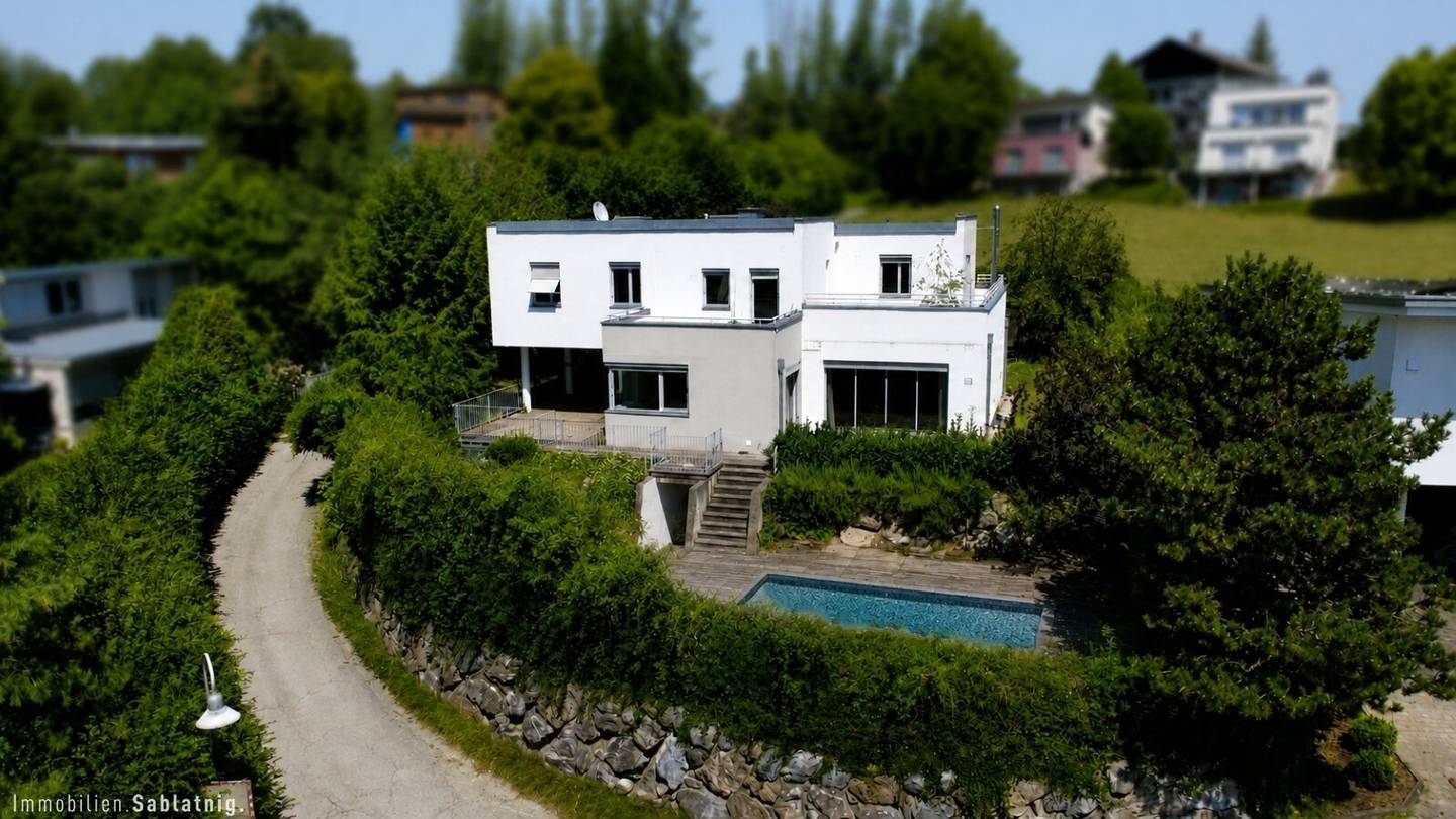 Exklusive Architektenvilla mit Pool &amp; Wellness in privilegierter Aussichtslage von Graz-Waltendorf!