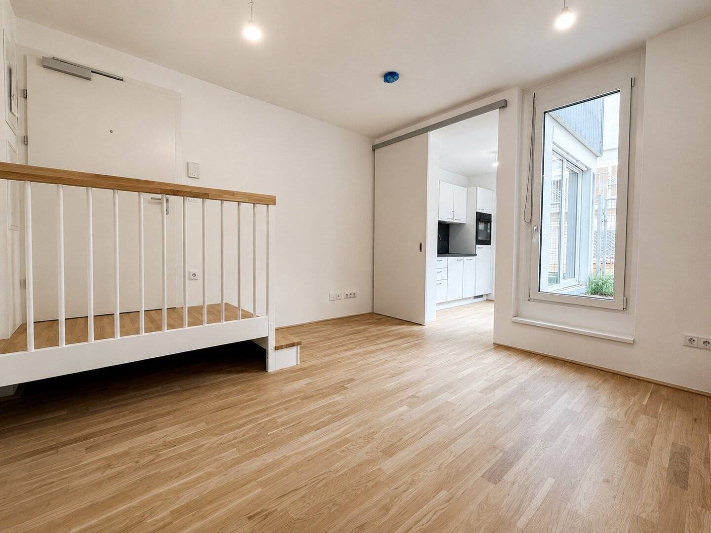 Erstbezug Gartenwohnung mit Balkon, Fußbodenheizung & Einbauküche