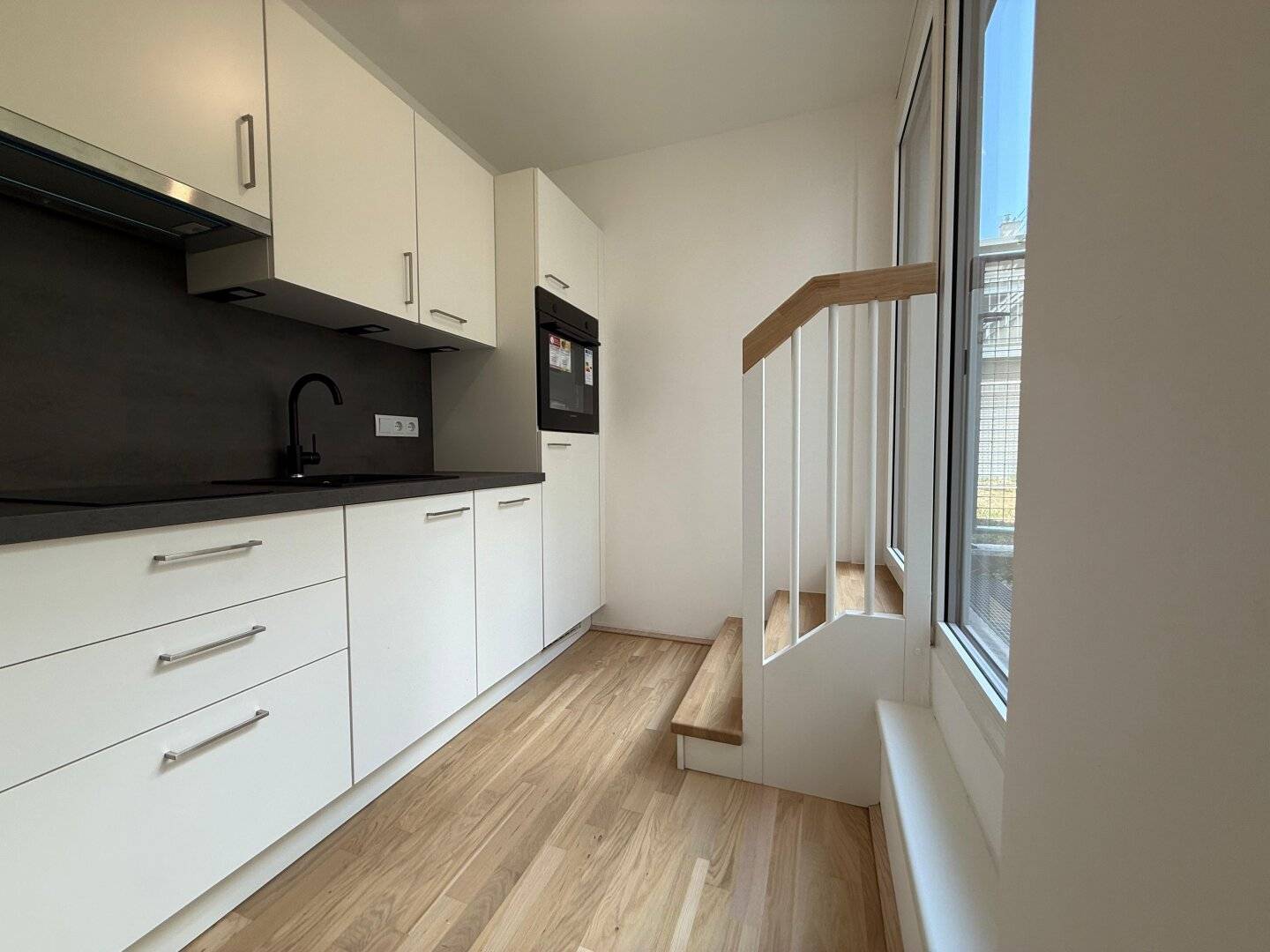 Erstbezug Gartenwohnung mit Balkon, Fußbodenheizung & Einbauküche