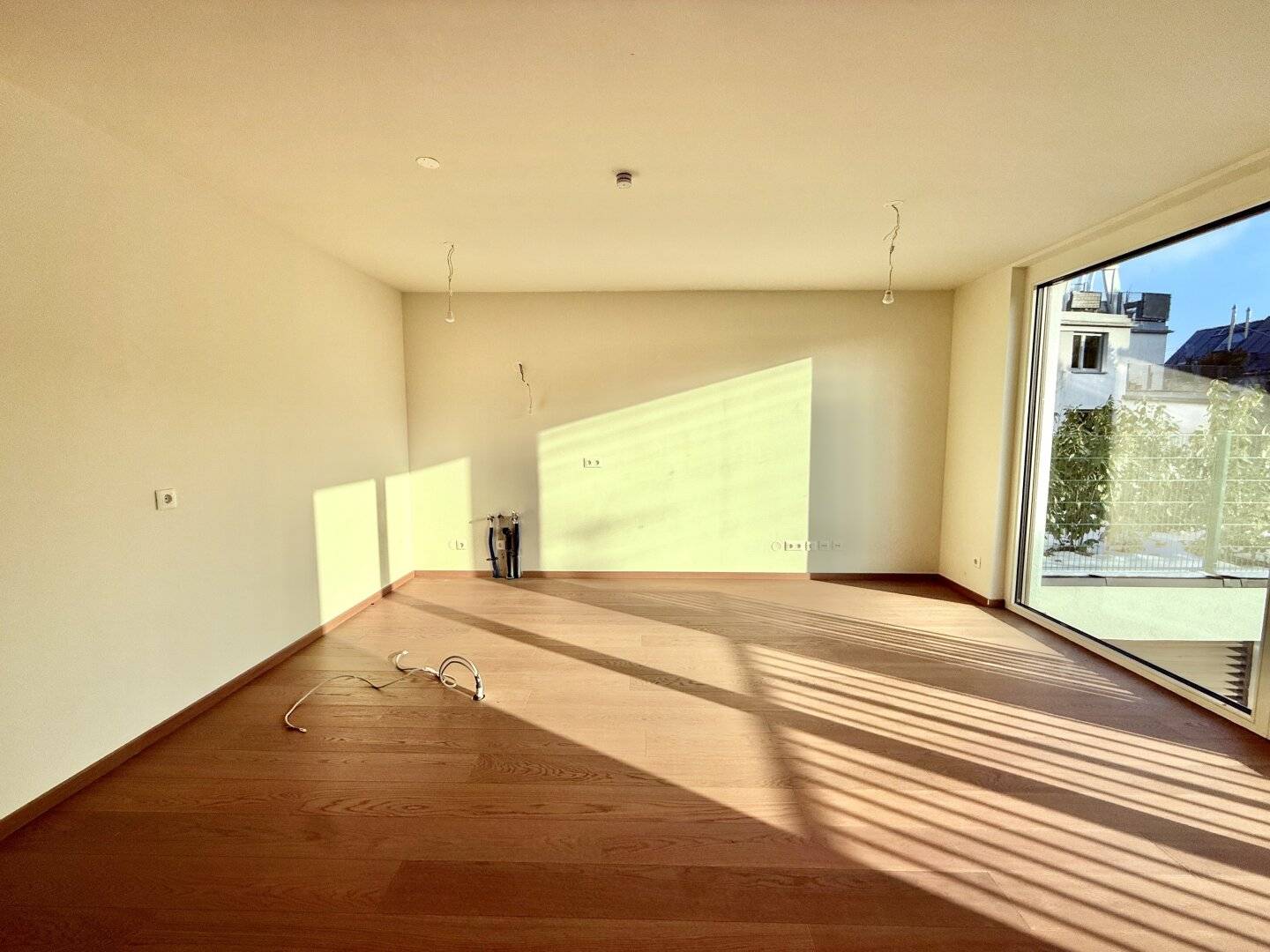 2-Zimmer-Erstbezug mit Fernblick, Fußbodenheizung & Tiefgarage (optional)