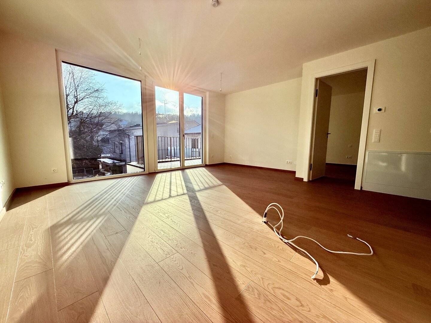 2-Zimmer-Erstbezug mit Fernblick, Fußbodenheizung & Tiefgarage (optional)