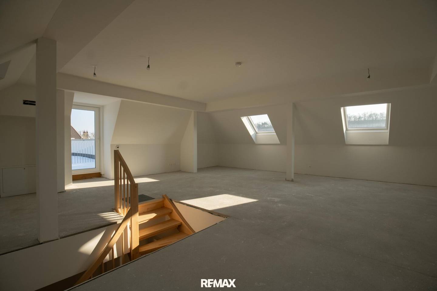 Neubauwohnung im Stadtzentrum mit Ausbaupotenzial & Dachterrasse