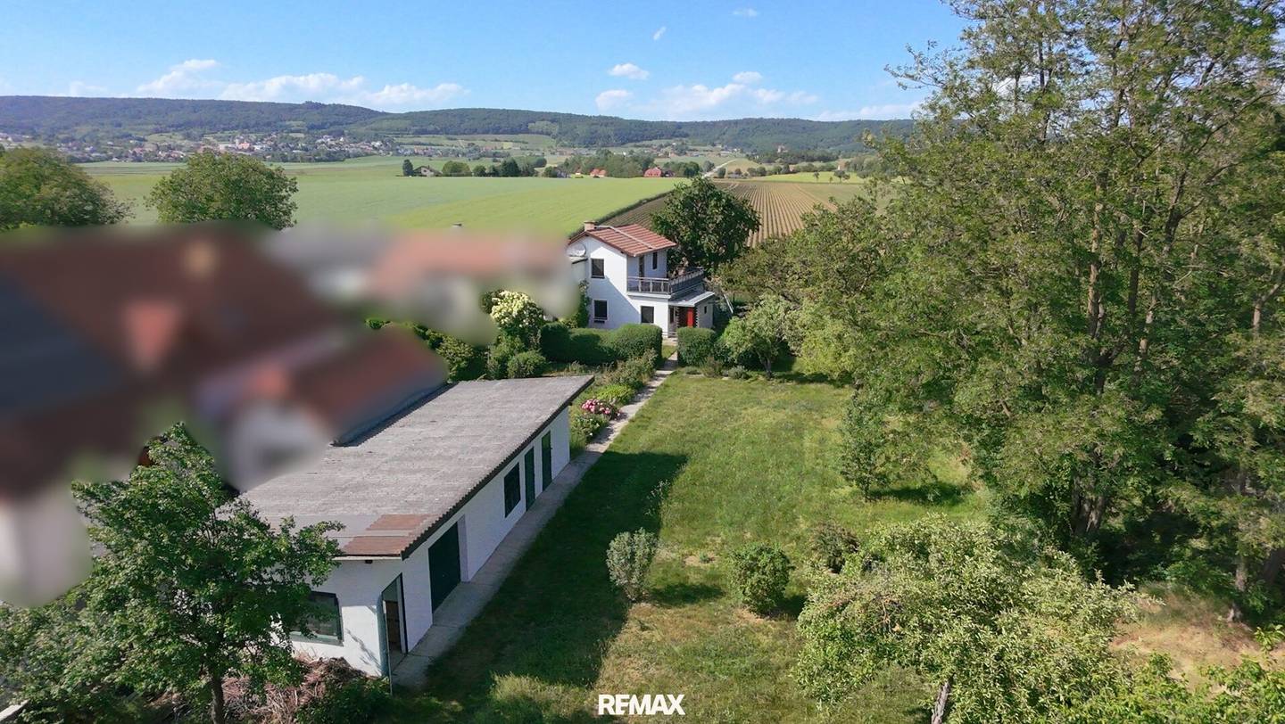 Einzigartiges Immobilienpaket: Zwei Grundstücke & Eigentumswohnung
