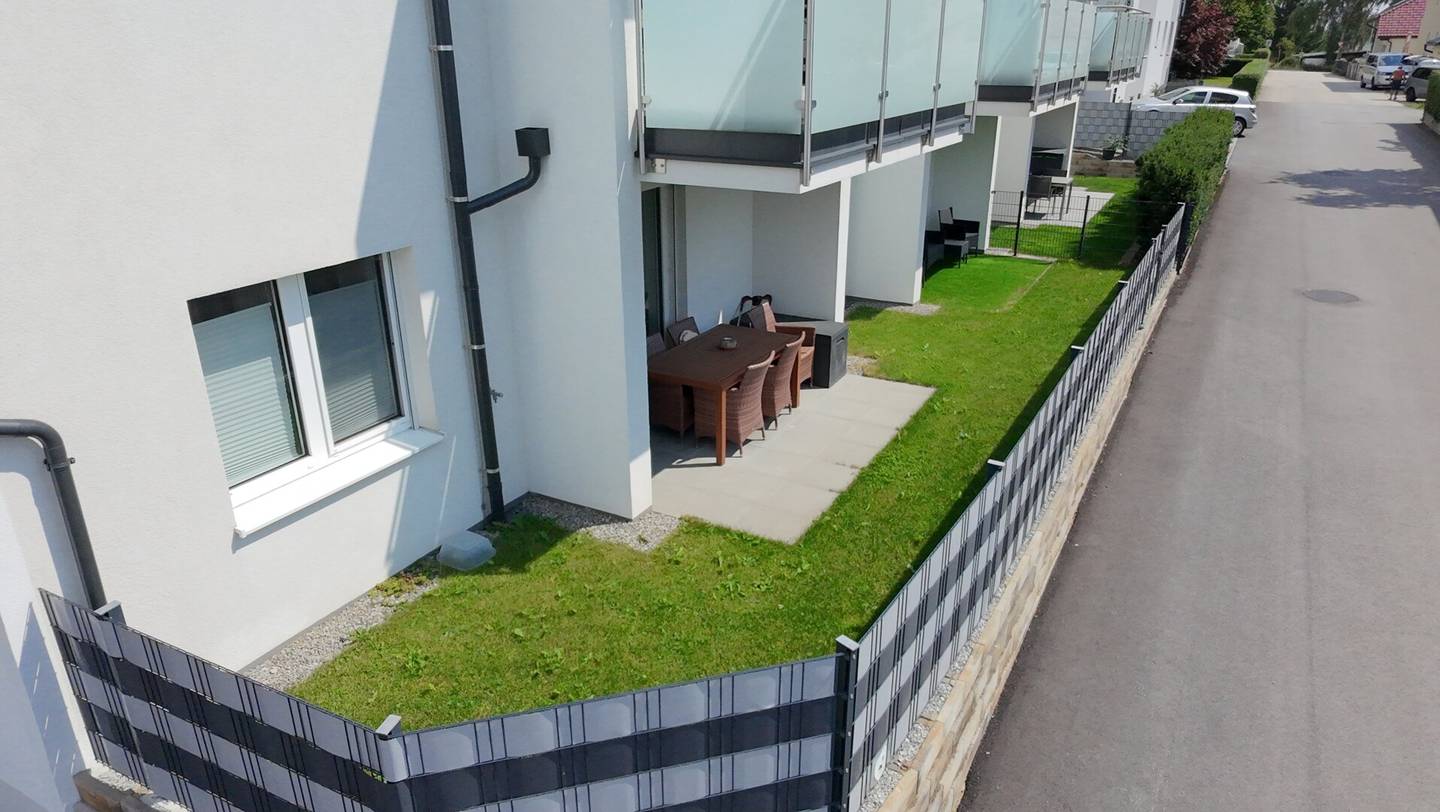 Moderne Gartenwohnung mit Westterrasse &amp; Eigengarten – modernes Wohnen in zentraler Ruhelage!