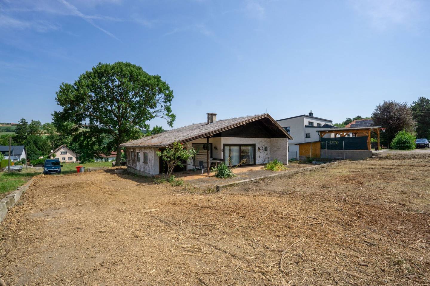 Kleines Einfamilienhaus auf 1.065 m² Baugrund mit Entwicklungspotenzial in Unter-Oberndorf