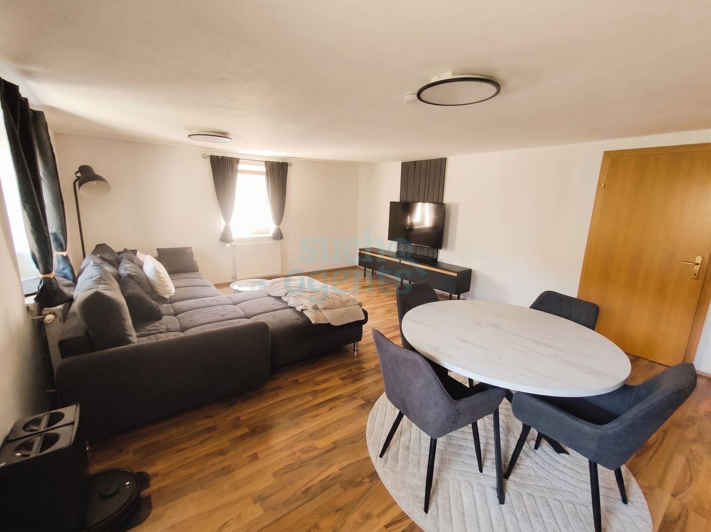 Erdgeschosswohnung mit Gartenmitbenutzung und Stellplatz