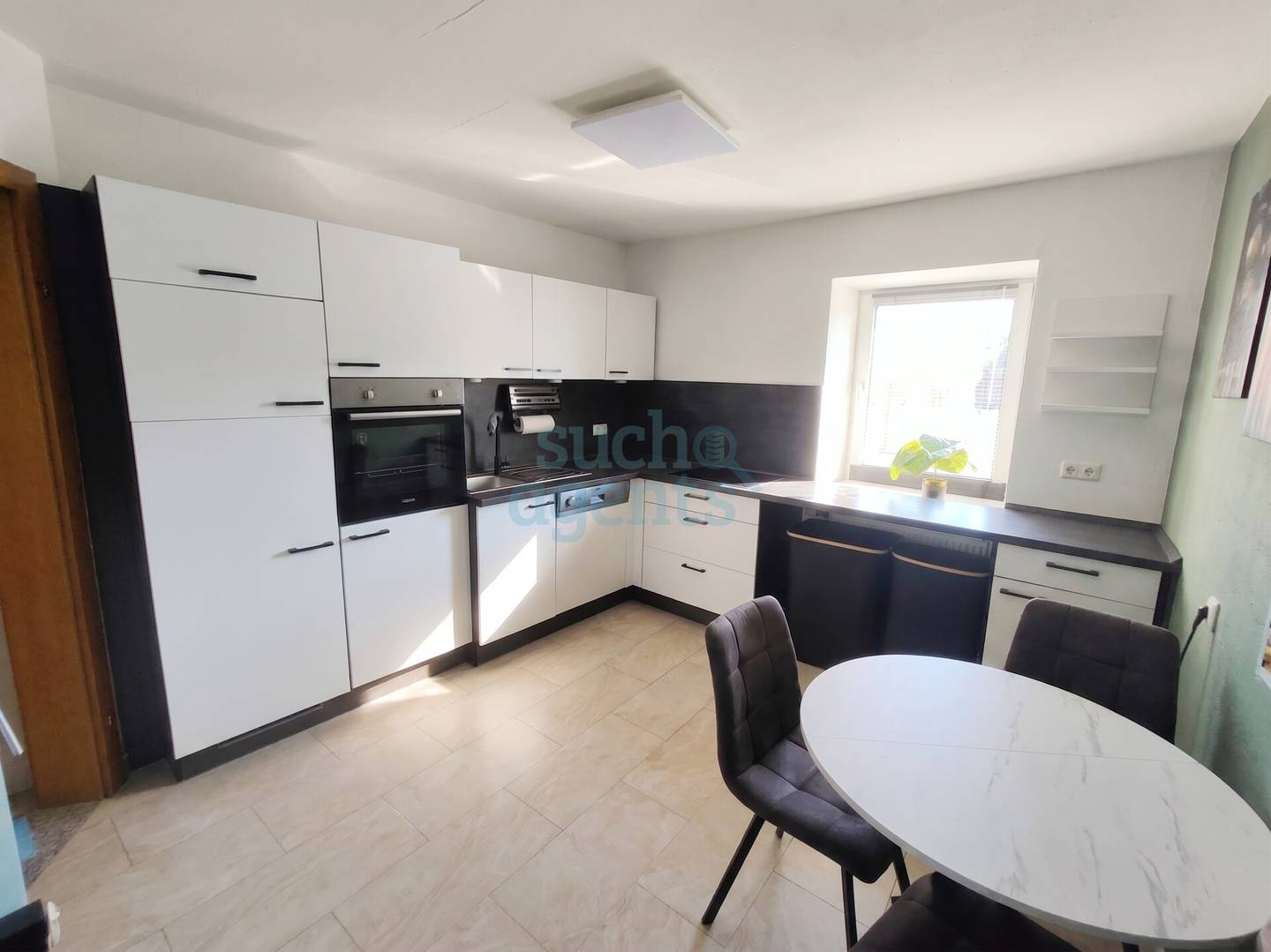 Erdgeschosswohnung mit Gartenmitbenutzung und Stellplatz