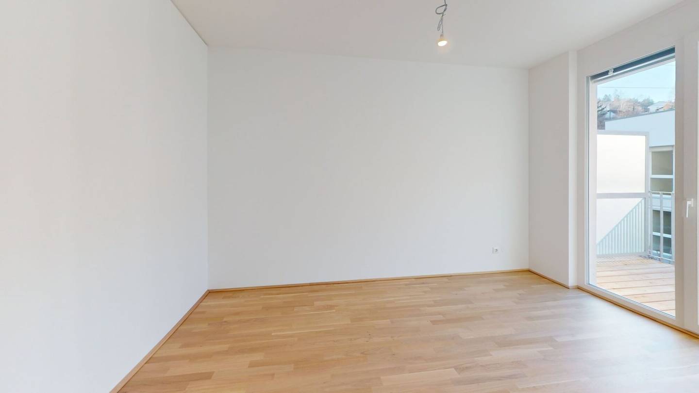 Wohnung im Neubau mit Balkon und Garage