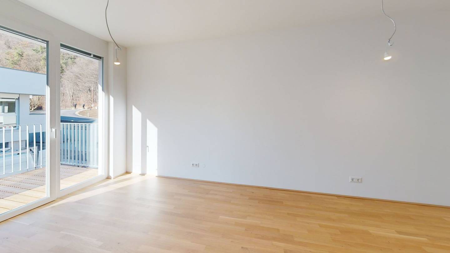 Wohnung im Neubau mit Balkon und Garage