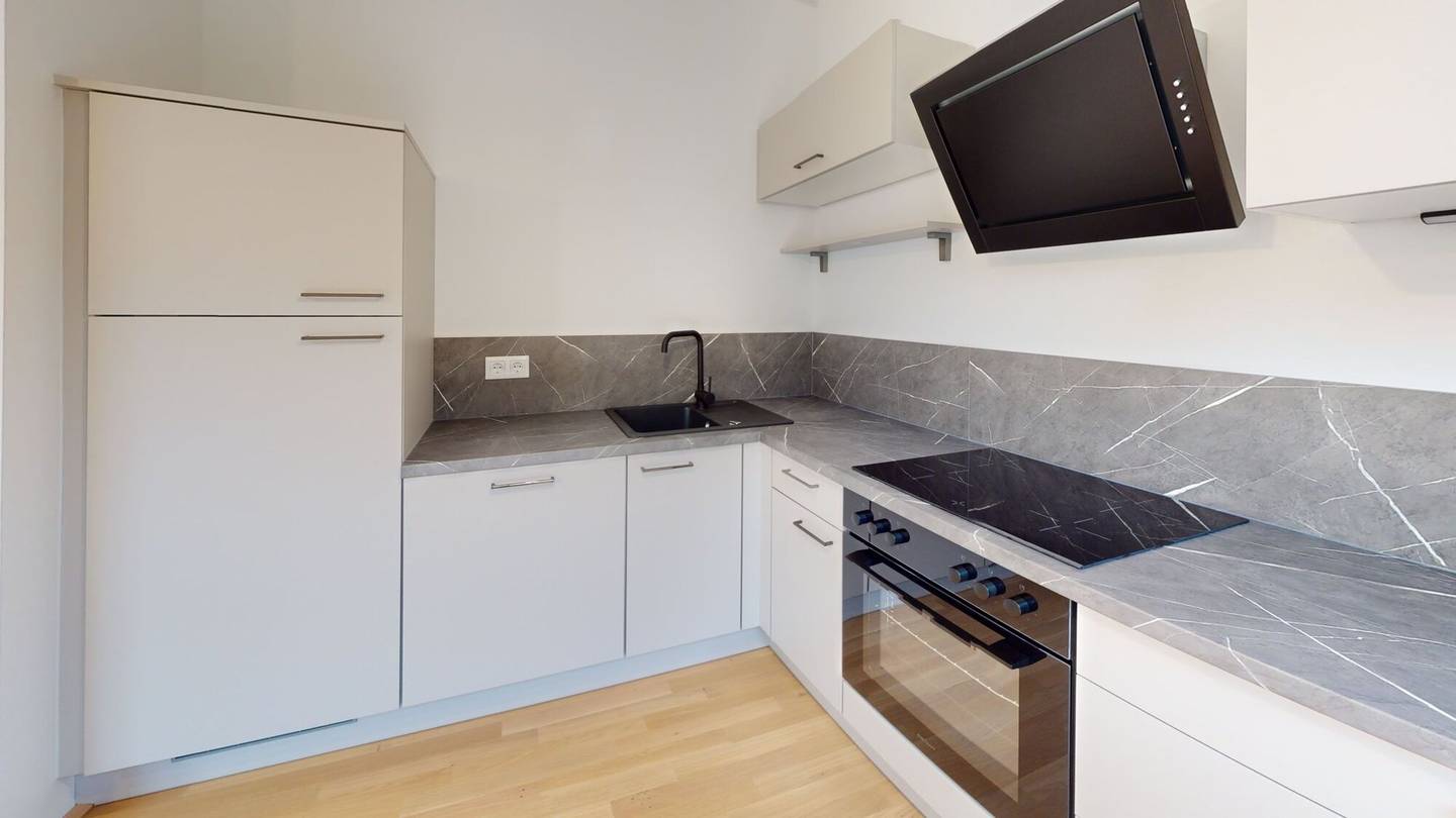 Investment apartment with two balconies and garage