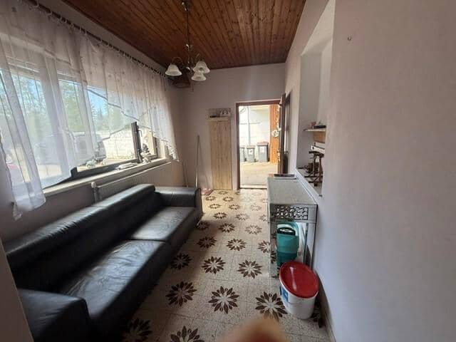 Family apartment with park like garden and garage spaces